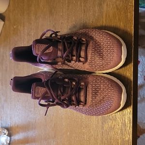 Nike rival big girl shoes.